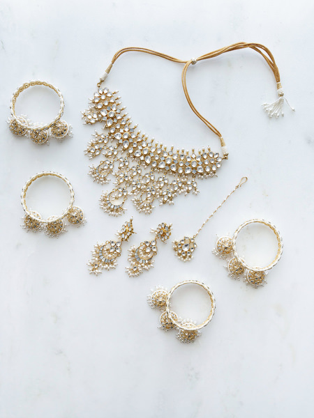 Traditional Indian bridal jewelry including necklace and bangles prepared for an Athens Riviera Indian wedding at Grand Hyatt Athens