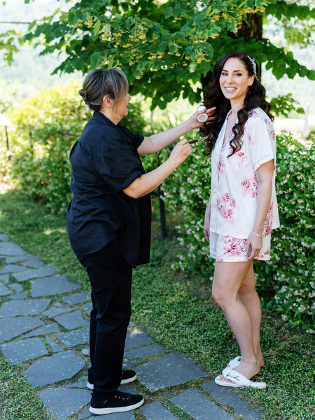 Bride getting ready in the gardens of Villa Corsini a Mezzomonte, luxury Jewish wedding in Florence.