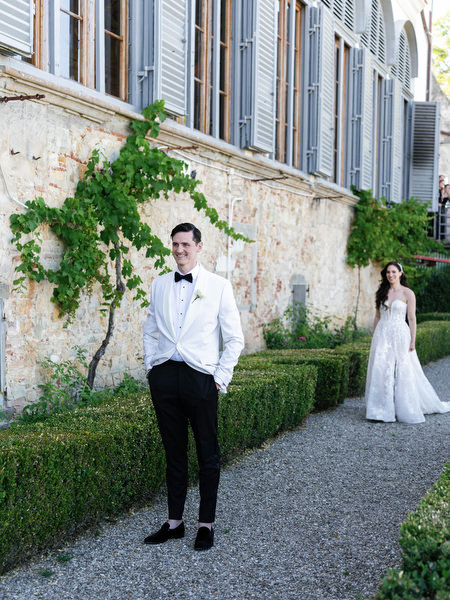 Groom in the gardens of Villa Corsini a Mezzomonte, romantic Florence destination wedding in Tuscany.