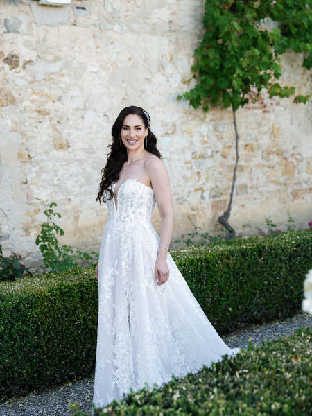 Bride walking through Villa Corsini gardens, luxury Jewish wedding in Florence, Tuscany.