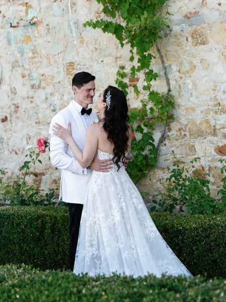Bride and groom portrait in the gardens of Villa Corsini a Mezzomonte, luxury Jewish wedding in Florence, Tuscany.