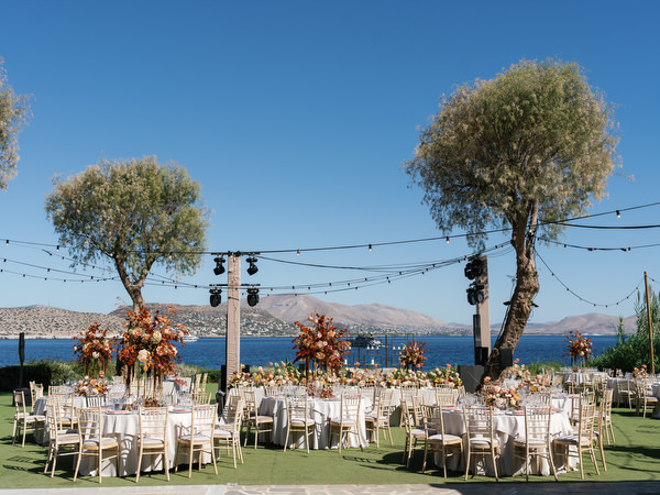 Wide view of the Athens Riviera ceremony lawn at Island Resort set for a three-day Indian wedding celebration
