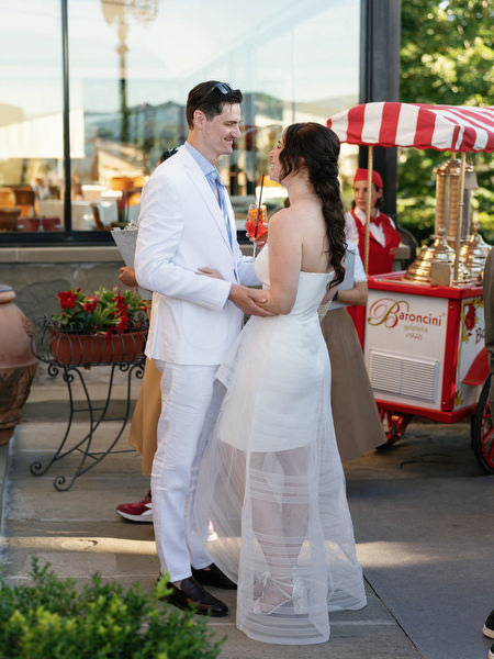 Bride and groom greeting guests during Florence pre-wedding welcome party