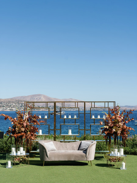 Lounge and ceremony backdrop design for an Indian wedding in Athens at Island Resort