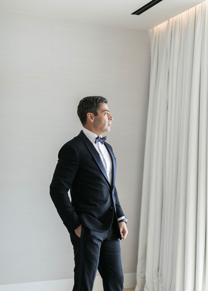 Grooms portrait before the ceremony at Four Seasons Astir Palace during a refined Athens Riviera wedding