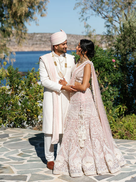 Romantic couple portrait with Aegean Sea backdrop at Island Resort the Residence