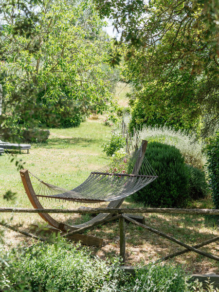 Relaxing lounge bed at Tuscany wedding weekend pool party