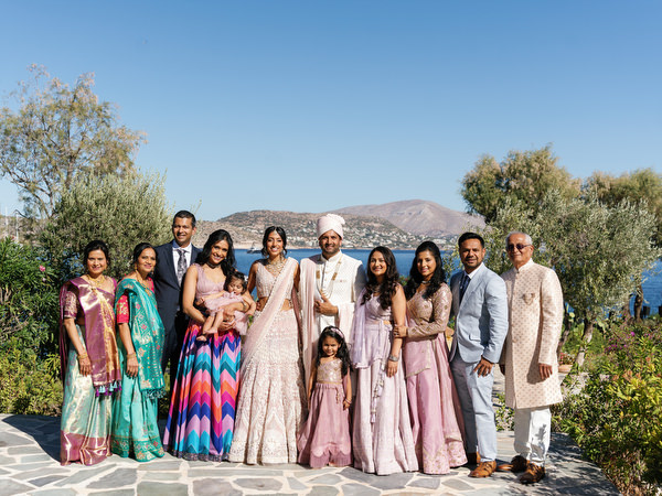 Family group portrait during a three-day Indian wedding celebration at Island Resort the Residence