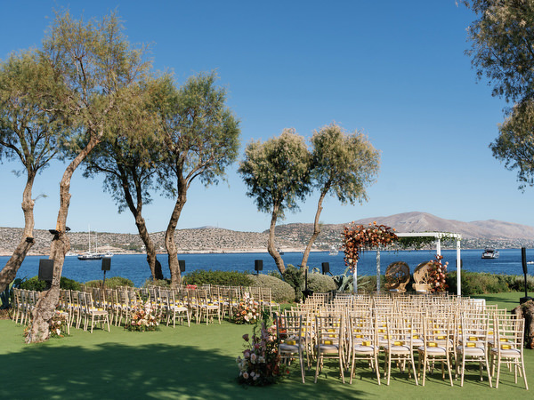 Seaside ceremony lawn setup overlooking the Aegean at Island Resort the Residence