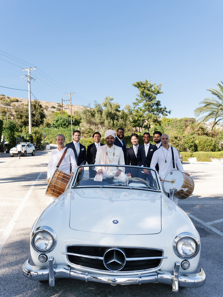 Groom arriving in vintage Mercedes during a three-day Indian wedding at Island Resort the Residence