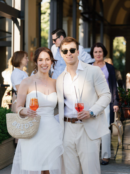 Couple walking with guests during Florence wedding weekend welcome party