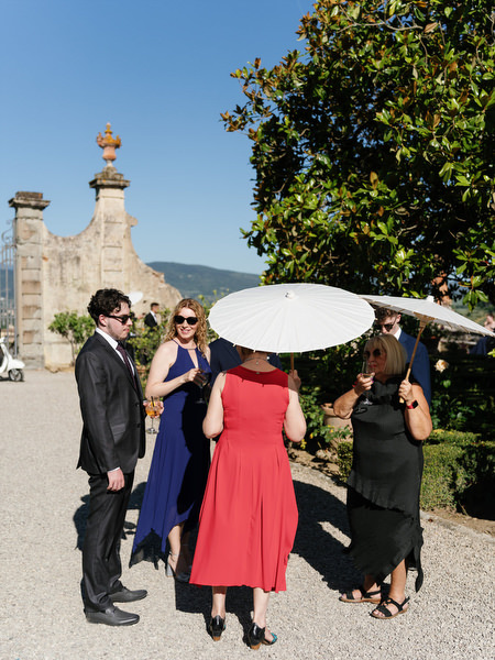 Wedding guests enjoying Tuscan sunshine at Villa Corsini a Mezzomonte, Florence Jewish wedding.