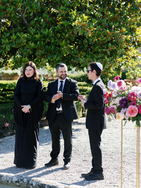 Guests mingling before ceremony at Villa Corsini, historic Florence wedding venue in Tuscany.
