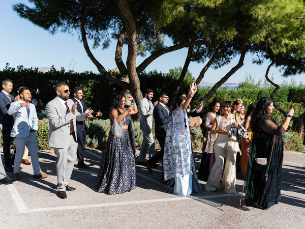 Guests dancing during the baraat procession at Island Resort the Residence