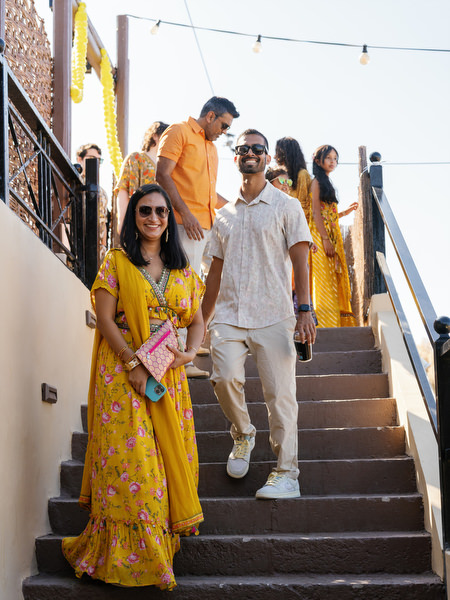 Guests walking down stairs to Haldi ceremony at Rubirosa