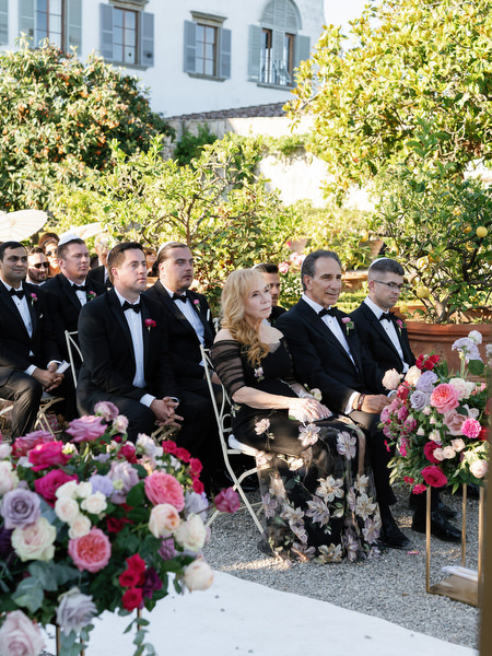 Guests seated during Jewish wedding ceremony at Villa Corsini a Mezzomonte, Florence, Tuscany.