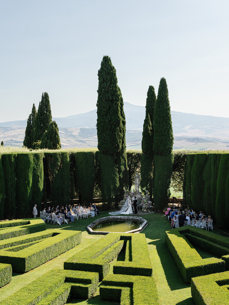 Panoramic view of La Foce garden ceremony overlooking rolling hills of Tuscany