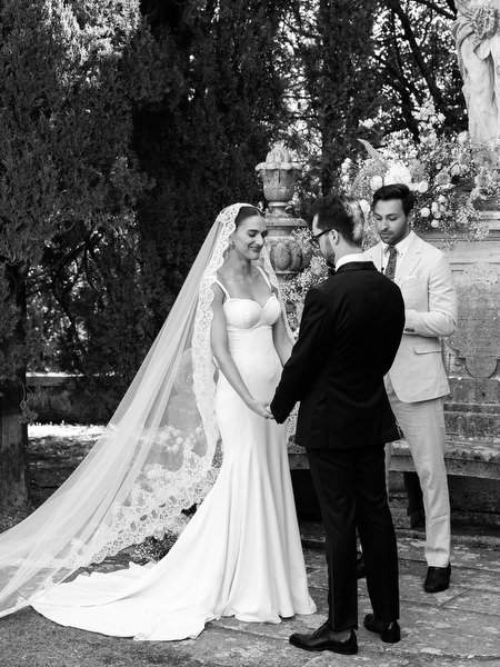Timeless black and white wedding ceremony portrait in the Tuscan countryside