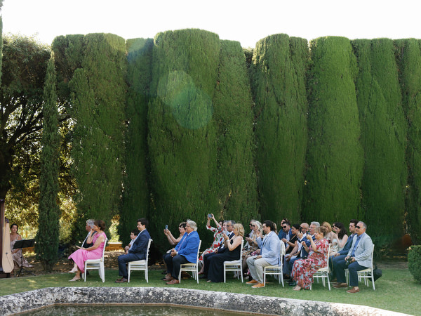 Symmetrical Renaissance garden ceremony at La Foce during destination wedding in Tuscany