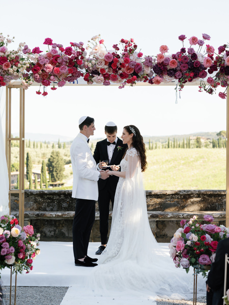 Ring exchange during Jewish wedding at Villa Corsini a Mezzomonte, Florence, Tuscany.