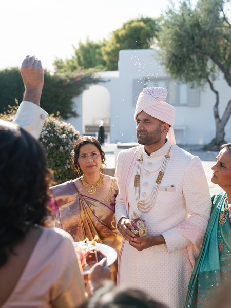 Groom participating in Hindu wedding rituals at Island Resort the Residence