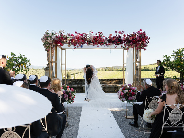 First kiss at Jewish wedding at Villa Corsini, luxury Florence wedding in Tuscany.