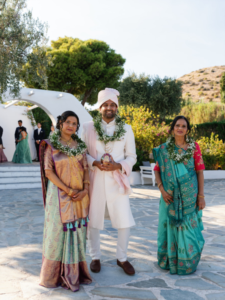 Groom posing with family before the ceremony at Island Resort the Residence