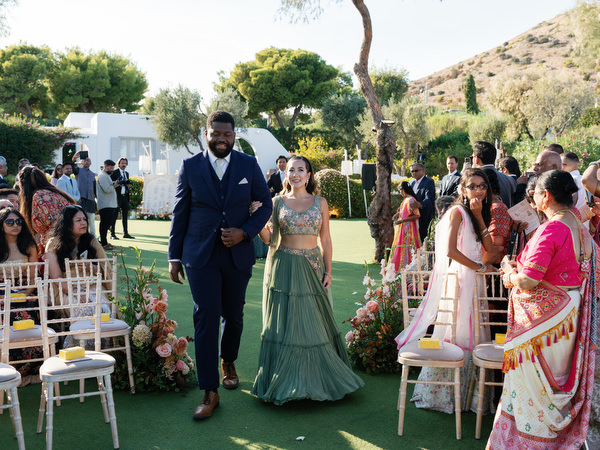 Wedding party entrance during a luxury Indian wedding at Island Resort the Residence
