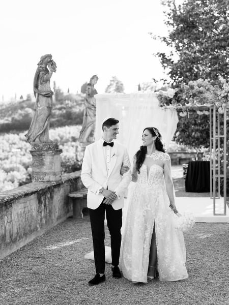 Bride and groom walking at Villa Corsini a Mezzomonte, timeless Jewish wedding in Florence, Tuscany.