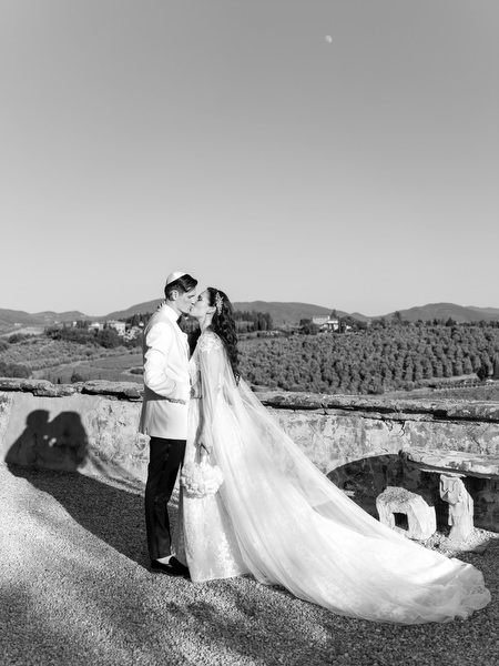 Newlyweds at Villa Corsini a Mezzomonte overlooking Tuscany countryside, destination wedding in Florence.