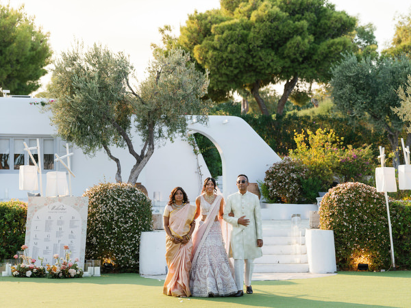 Bride preparing for her entrance at Island Resort the Residence during an Indian wedding in Athens