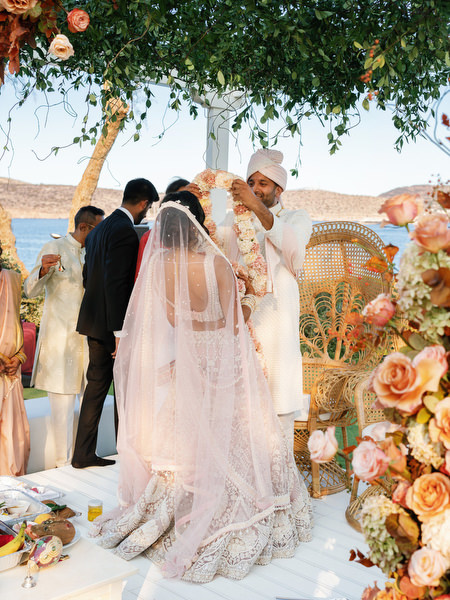 Bride and groom during sacred vows at Island Resort the Residence overlooking the Athens Riviera