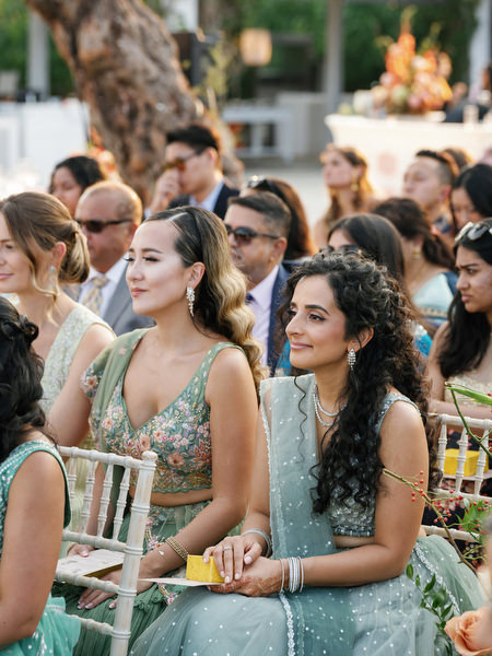 Guests attentively watching the Hindu wedding ceremony at Island Resort the Residence