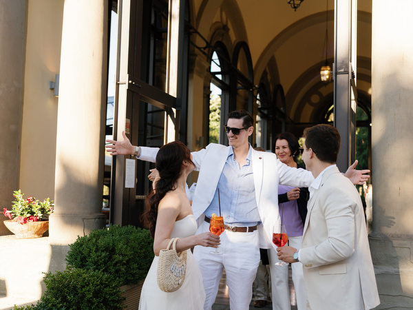 Wedding guests mingling during welcome party at La Loggia Florence