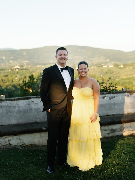 Wedding guests posing at Villa Corsini a Mezzomonte overlooking Tuscany hills during Florence Jewish wedding reception.