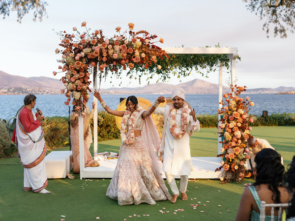 Couple walking together after completing ceremony rituals at Island Resort the Residence