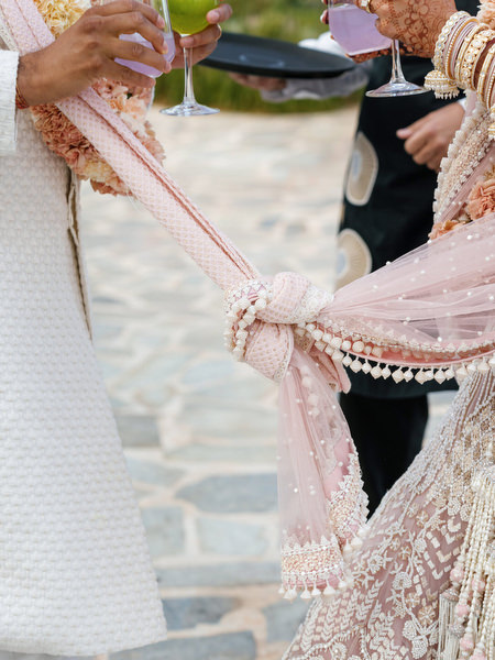 Close-up of traditional wedding knot ritual at Island Resort the Residence