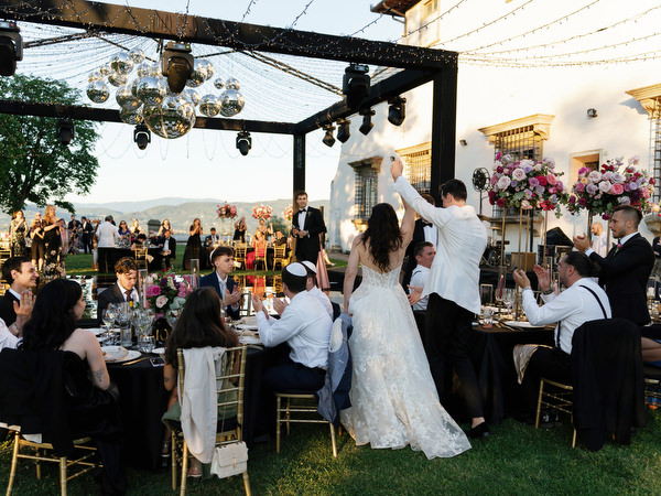 Bride and groom grand entrance at Villa Corsini a Mezzomonte reception in Florence, Tuscany wedding.