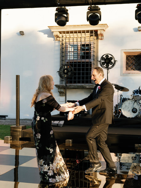 Family dancing on black and white dance floor at Villa Corsini a Mezzomonte, Florence wedding reception.