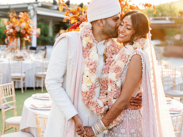Romantic golden hour embrace at Island Resort the Residence overlooking the Athens Riviera