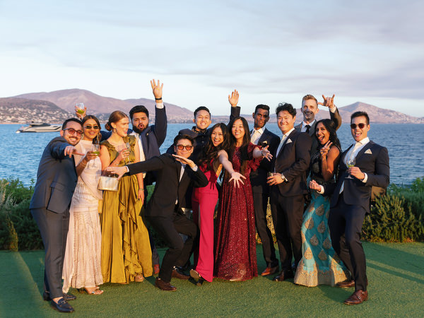 Group celebration portrait on the lawn at Island Resort the Residence Athens Riviera