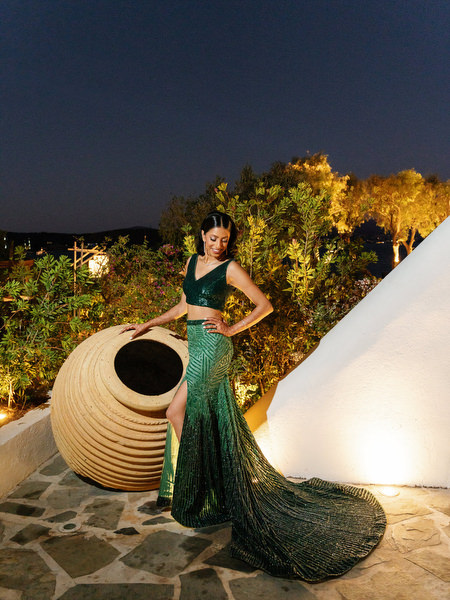 Elegant evening portrait of guest in green gown at Island Resort the Residence Athens Riviera