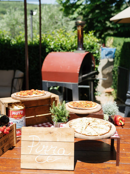 Pizza oven cooking during Borgo I Vicelli wedding weekend event