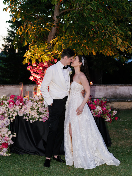Romantic evening portrait of bride and groom at Villa Corsini Tuscany wedding reception.