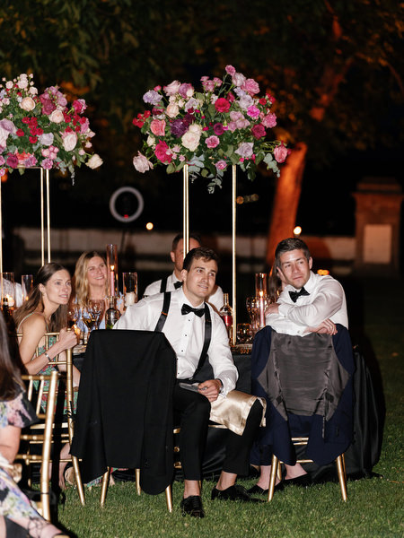 Guests seated at night reception tables at Villa Corsini Florence Jewish wedding.