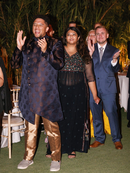 Guests applauding during evening celebration at Island Resort the Residence
