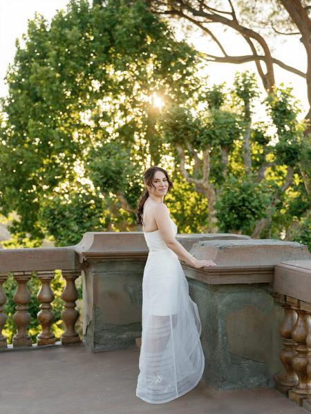 Bride walking through Tuscan garden during Florence wedding weekend