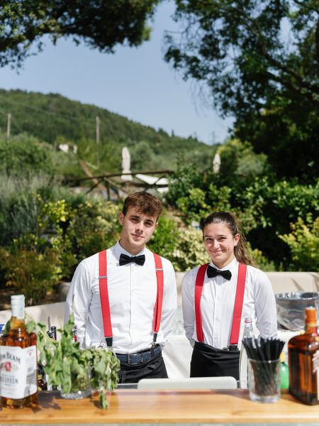 Bartender preparing cocktails during Tuscany poolside celebration