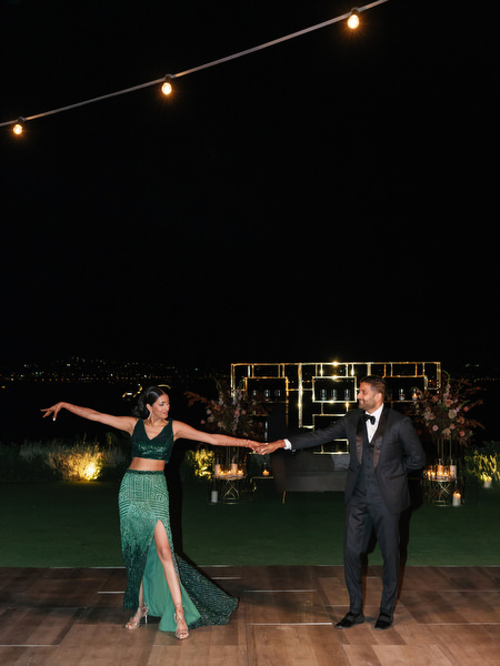 Couple dancing under fairy lights at Island Resort the Residence Athens Riviera