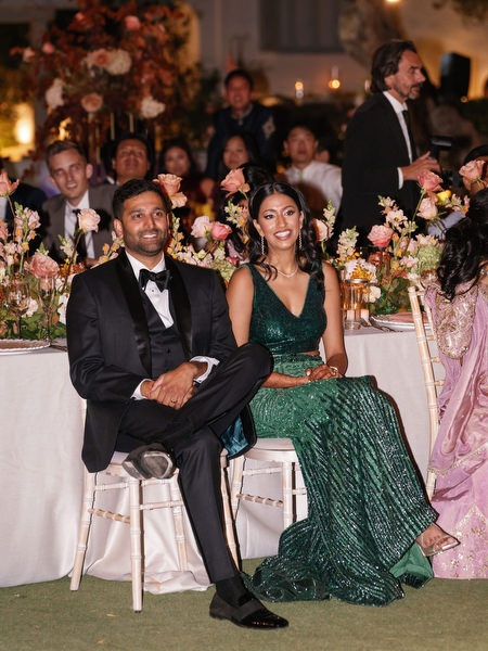 Bride and groom seated at reception table at Island Resort the Residence on the Athens Riviera